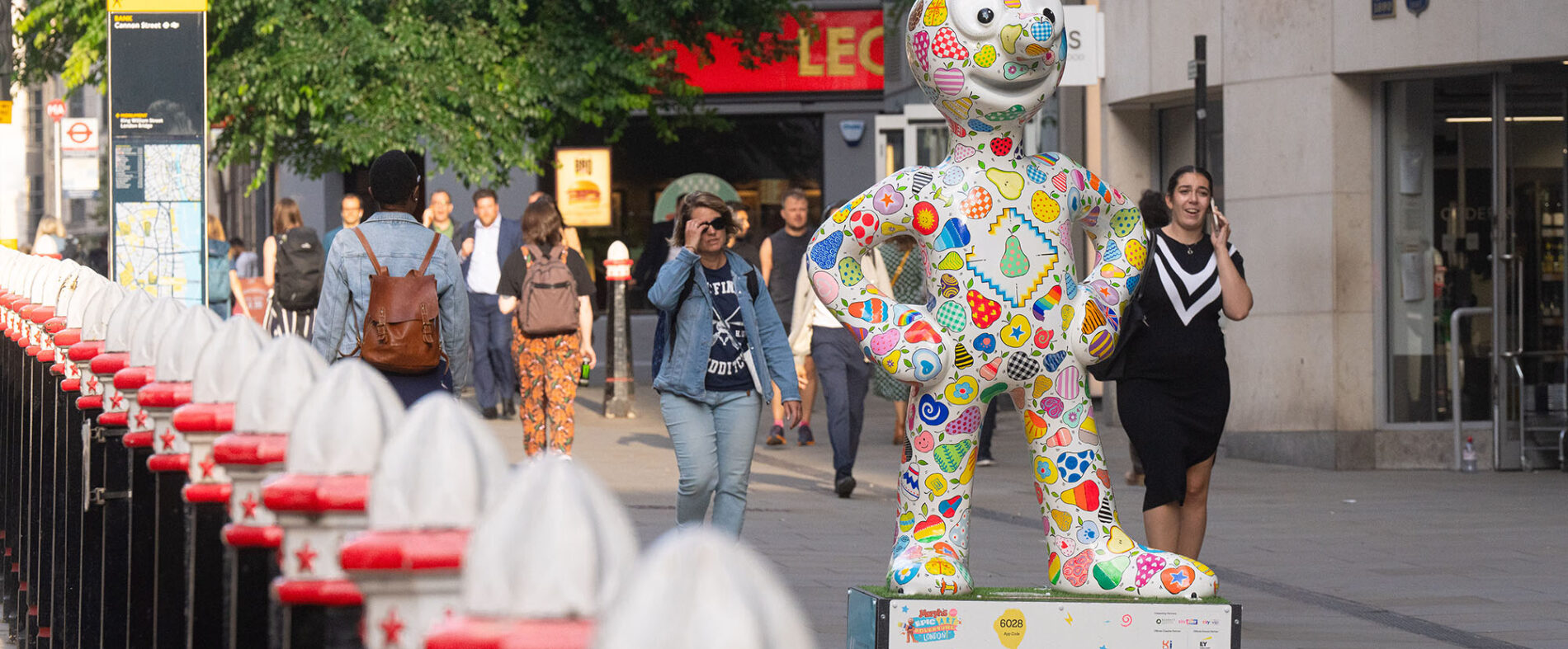 Multi colour statue on street